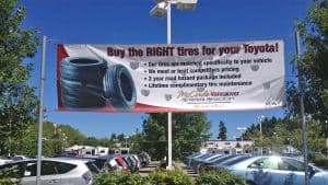 An outdoor banner for Toyota tires.